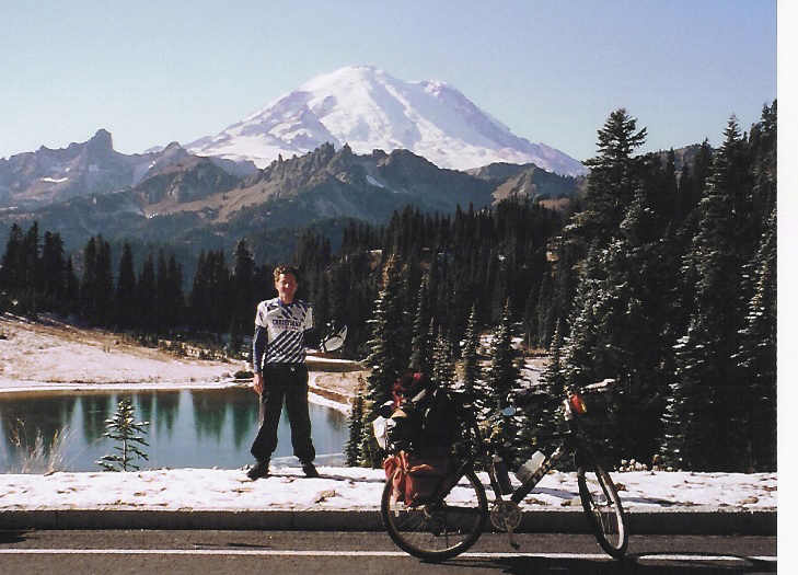 Joe and his bike in front of Mt Rainier.